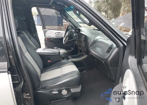 2003 Ford F-150 Lariat z USA, uszkodzony, nr VIN 1FTRW07323KD04865